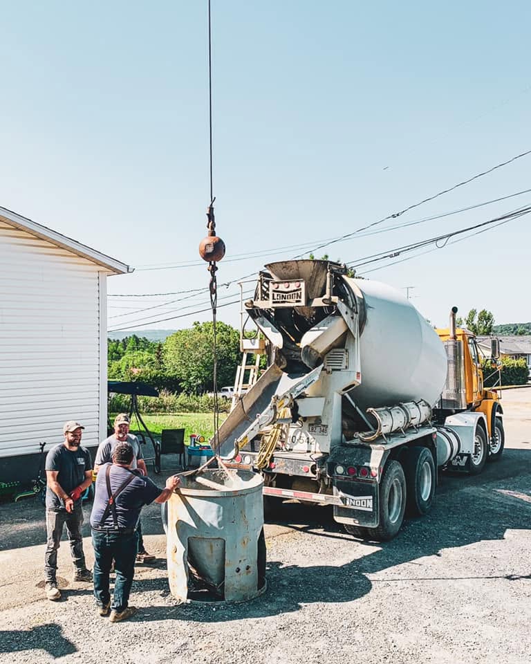 Concrete pump pour on a residential foundation
